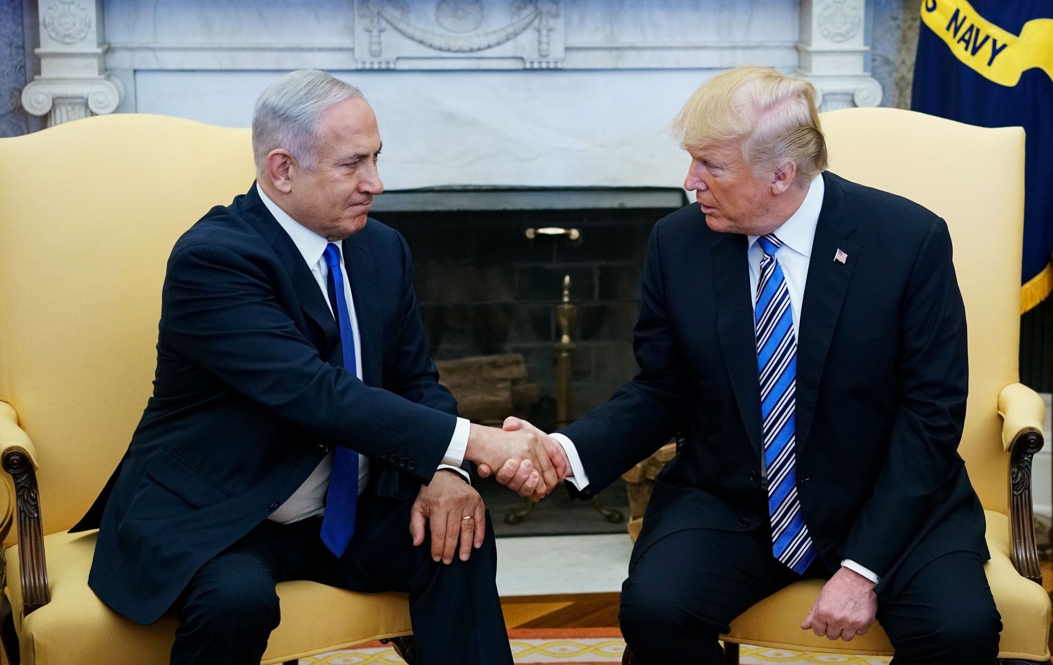 Donald Trump shakes hands with Israel's Prime Minister Benjamin Netanyahu in the Oval Office of the White House (AFP Photo)