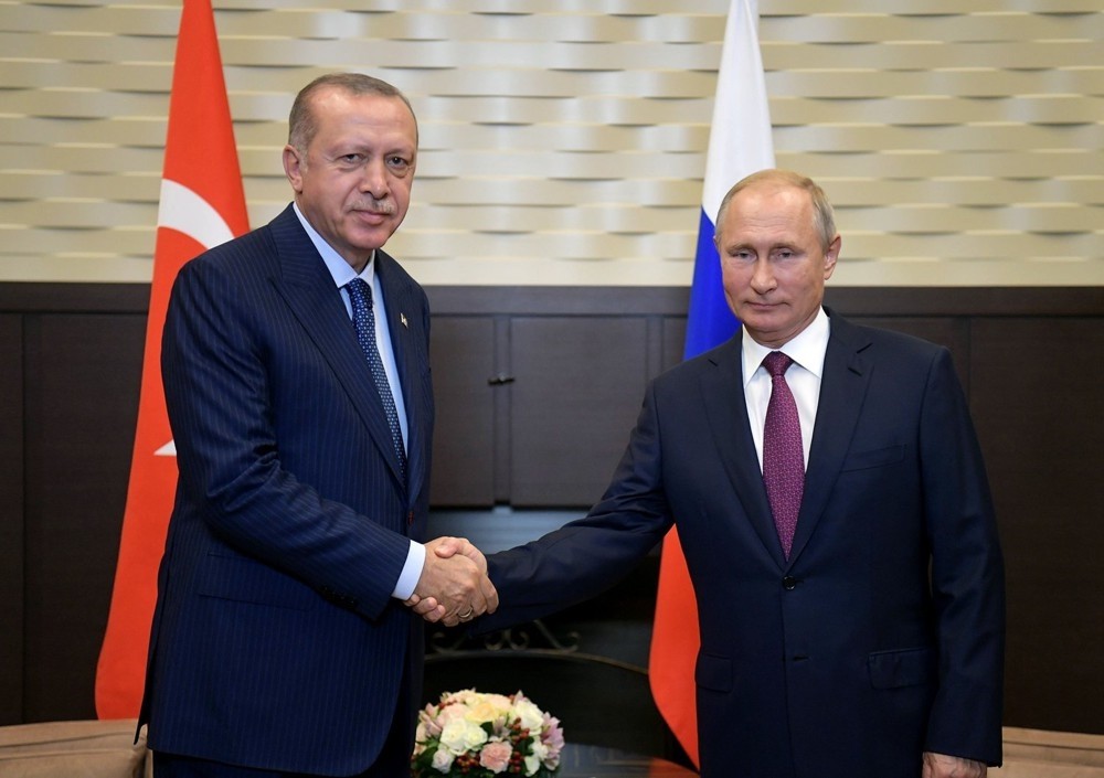 Russian President Vladimir Putin and President Recep Tayyip Erdou011fan shake hands during their meeting at the Bocharov Ruchey residence in Sochi yesterday.