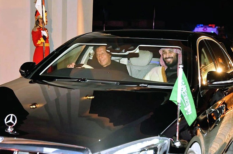 In this photo released by the Press Information Department, Pakistani Prime Minister Imran Khan, left, with Saudi Arabia's Crown Prince Mohammed bin Salman, right, leave from Nur Khan airbase in Rawalpindi, Pakistan, Feb. 17, 2019. (AP Photo)