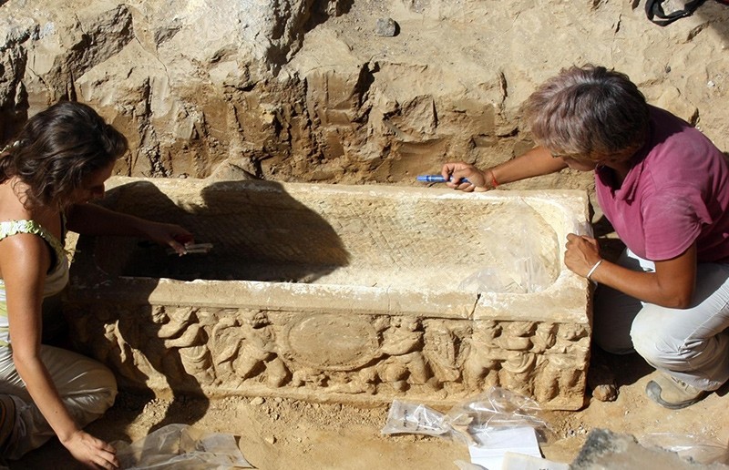 A handout photo made available by the Rome Press Office shows that two Roman sarcophagi have been found during work to place pipes near the Olympic Stadium, in Rome, 23 August 2017