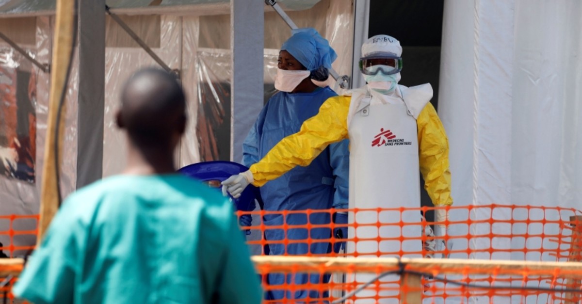 A health worker dressed in a protective suit talks to medical staff at the newly constructed MSF(Doctors Without Borders) Ebola treatment centre in Goma, Democratic Republic of Congo, August 4, 2019. (REUTERS Photo)