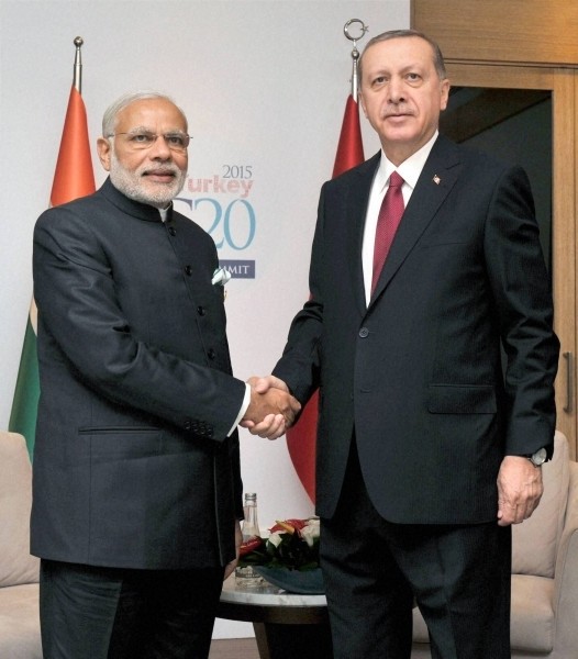 President Recep Tayyip Erdou011fan welcoming Indian Prime Minister Narendra Modi et the G20 meeting held in the Turkish resort city of Antalya, Nov. 16, 2015.