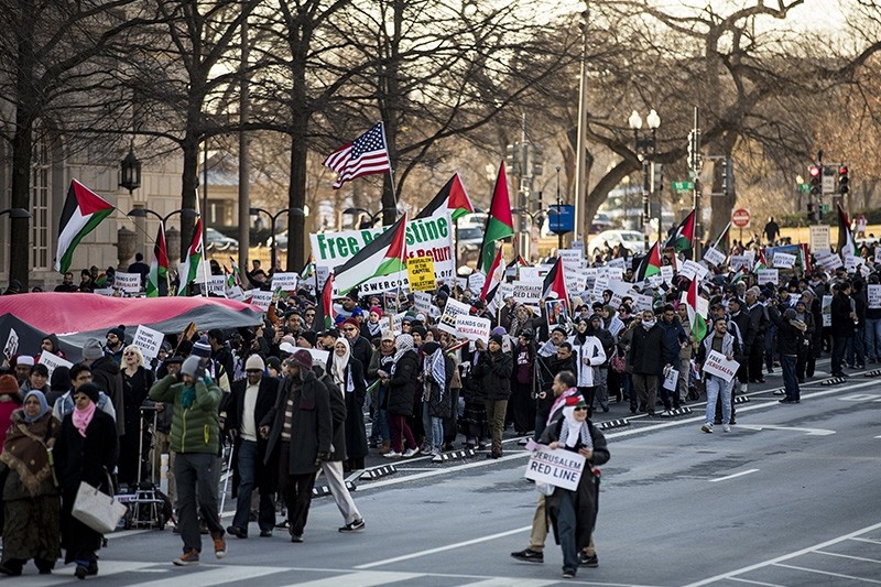 Demonstrators walk in protest against the U.S. decision to recognize Jerusalem as Israel's capital in Washington D.C. (AA Photo)