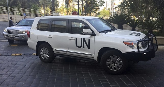 سيارات تقل فريق تقصي الحقائق من منظمة حظر السلاح الكيماوي في دمشق