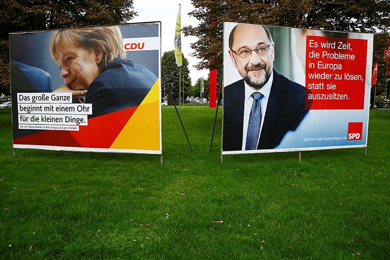 Election campaign posters show Angela Merkel, German Chancellor and leader of the Christian Democratic Union party CDU, and Martin Schulz, leader of Germany's Social Democratic party SPD, in Bonn, Germany, September 7, 2017. (Reuters Photo)