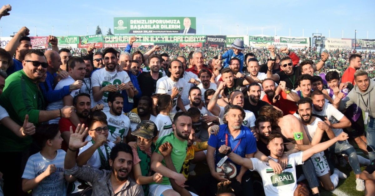 Denizlispor fans celebrate their team's 6-0 win against Karabu00fckspor at home, May 12, 2019.