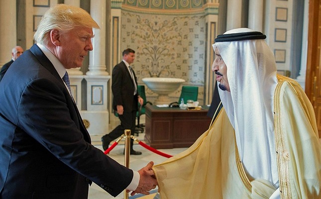 A handout photo made available by the Saudi Press Agency shows King Salman bin Abdulaziz al-Saud of Saudi Arabia (R), and U.S. President Donald Trump (L) shaking hands, Riyadh, Saudi Arabia, May 21, 2017.