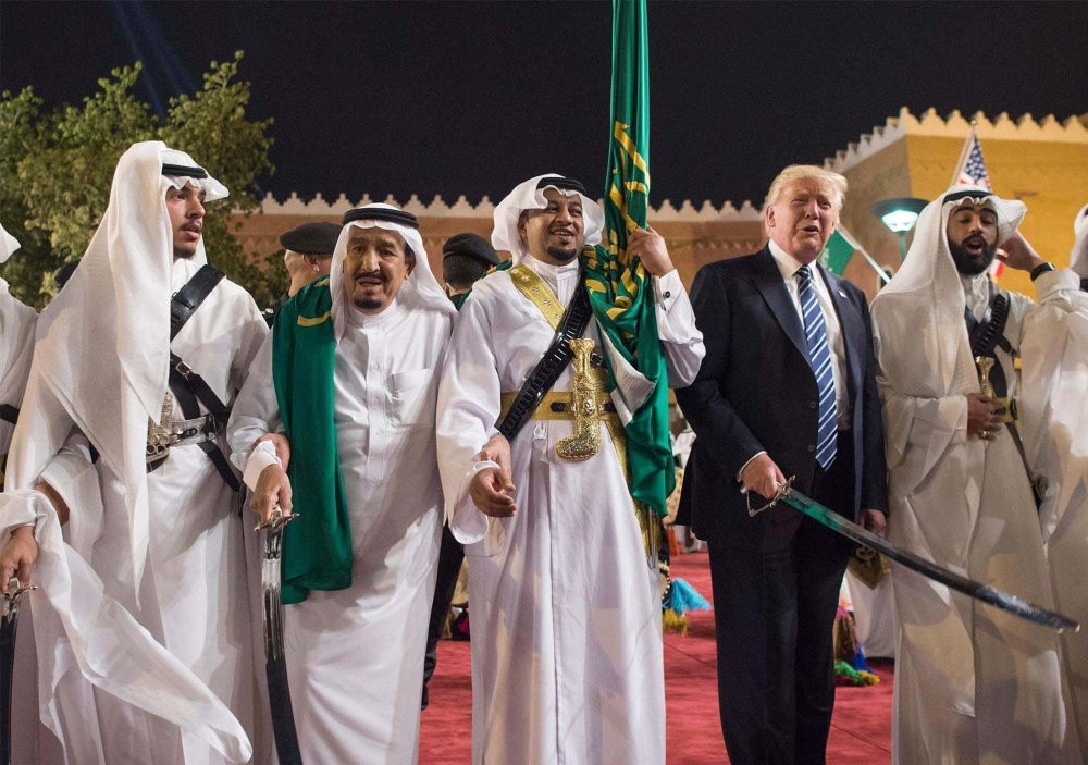 Donald Trump with Saudi Arabia's King Salman bin Abdulaziz seen during a welcome ceremony with traditional sword dancers at the Murabba Palace in Riyadh, Saudi Arabia, May. 20.