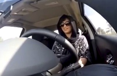 This Nov. 30, 2014 image made from video released by Loujain al-Hathloul, shows her driving towards the United Arab Emirates - Saudi Arabia border before her arrest on Dec. 1, 2014, in Saudi Arabia. (AP Photo)
