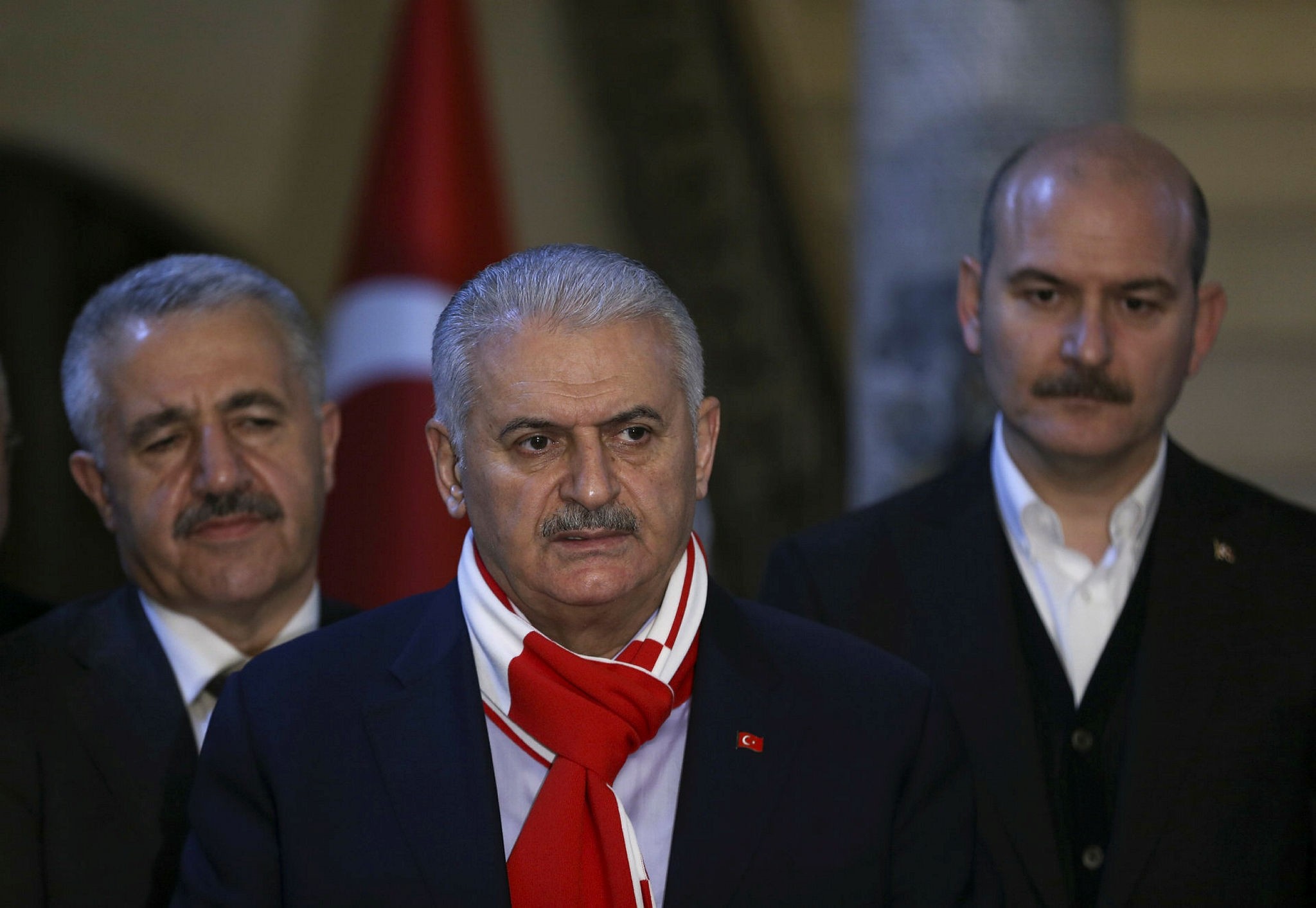 Minister of Transport, Maritime and Communication Ahmet Arslan (L), PM Yu0131ldu0131ru0131m (C) and Interior Minister Su00fcleyman Soylu stand during the Premier's speech in front of Kilis Governor's Office, February 4, 2018 (AA Photo)
