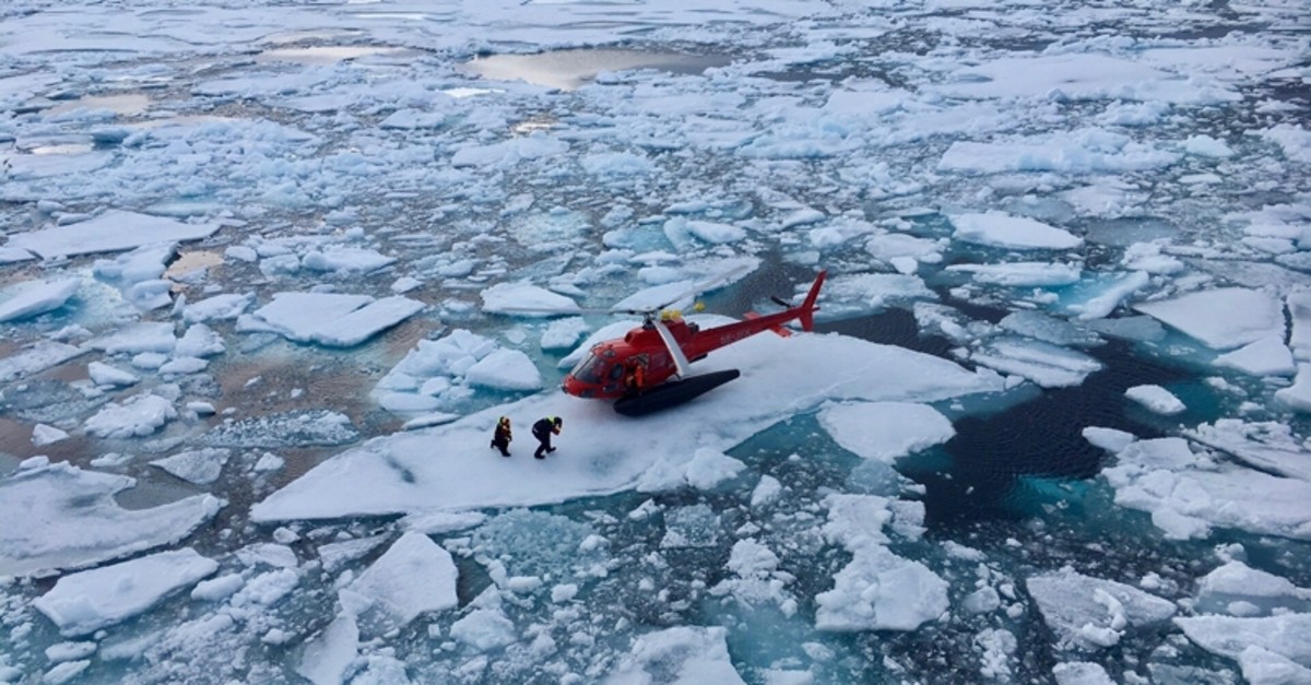 A helicopter from the Swedish icebreaker Oden lands on an ice floe to pick up crew members involved in the retrieval of a scientific acoustic recorder containing valuable data on Arctic marine life  movements in the Canadian Arctic (Reuters Photo)