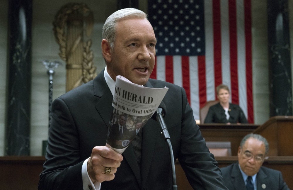 This image released by Netflix shows Kevin Spacey in a scene from ,House Of Cards., Netflix says it is suspending production of ,House of Cards, following harassment allegations against Spacey.