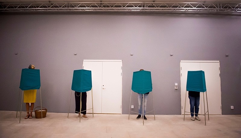 People vote in polling booths during election day in Stochholm, Sweden Sept. 9, 2018. (Reuters Photo)
