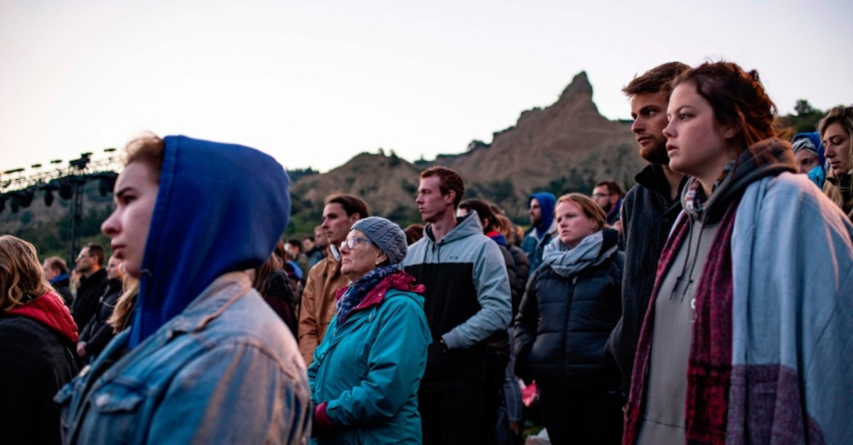 Visitors from Australia and New Zealand gather during a Dawn Service ceremony at Anzac Cove Beach, at u00c7anakkale on the Gallipoli Peninsula early April 25, 2019. (AFP Photo)
