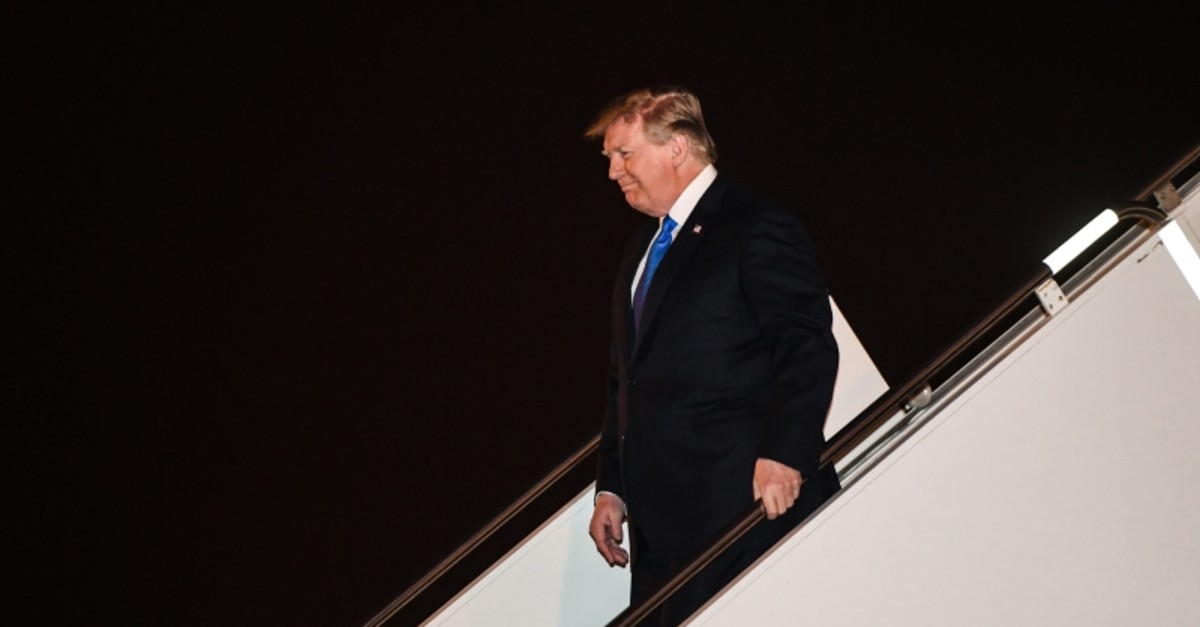 US President Donald Trump disembarks from Air Force One at Noi Bai International Airport in Hanoi, Vietnam, Feb. 26, 2019, upon his arrival for a second summit with North Korean leader Kim Jong Un. (AFP Photo)