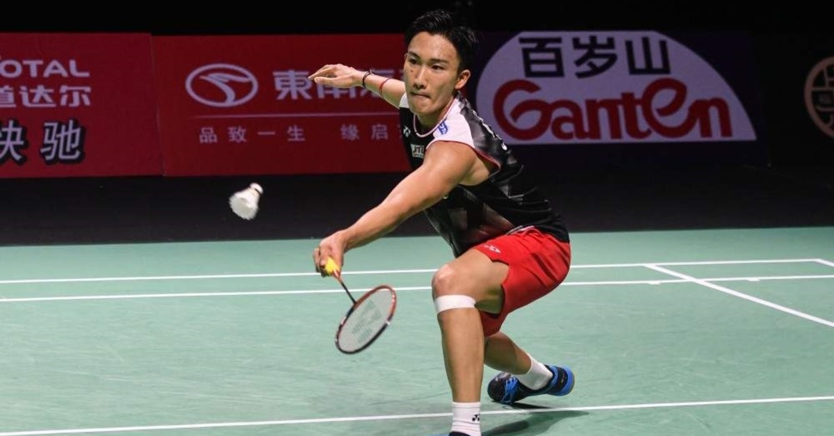 Kento Momota hits a return against Chou Tien-chen of Taiwan during their men's singles final match, Fujian, Nov. 10, 2019. (AFP Photo)