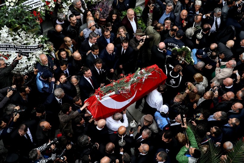 Turkish photographer Ara Güler's coffin is carried into the Üç Horon Armenian church during his funeral at Galatasaray Square on Istiklal avenue in Istanbul on October 20, 2018.