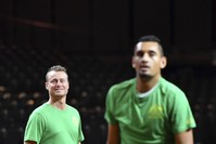 Team Australia's Nick Kyrgios (R), and team captain Lleyton Hewitt participate in a practice session prior to the Davis Cup World Group tennis semifinal in Brussels.