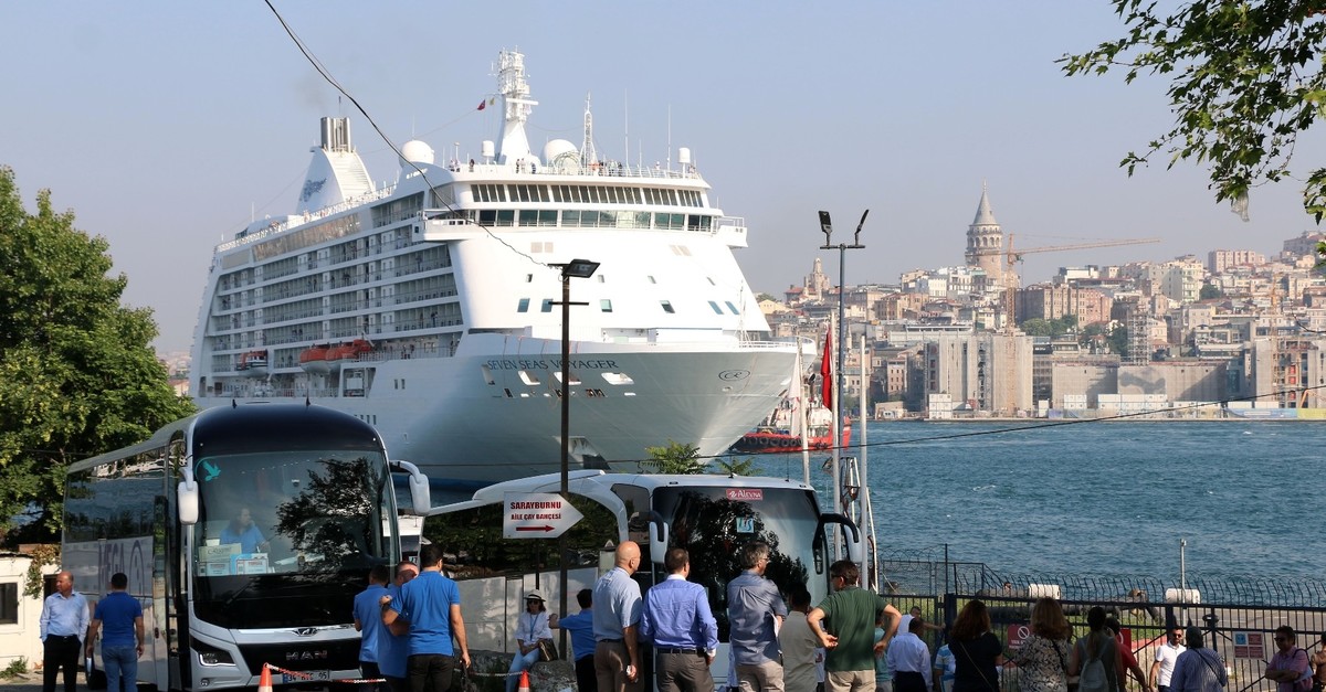 The 10-story Regent Seven Seas Voyager, carrying 750 passengers, is the first cruiser to dock in Istanbul in four years, June 6, 2019.