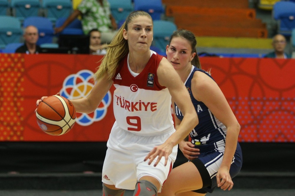 Bahar u00c7au011flar (R) of Turkey in action against Sabina Oroszova (L) of Slovakia during the group stage match of the EuroBasket Women 2017 in Hradec Kralove, Czech Republic.