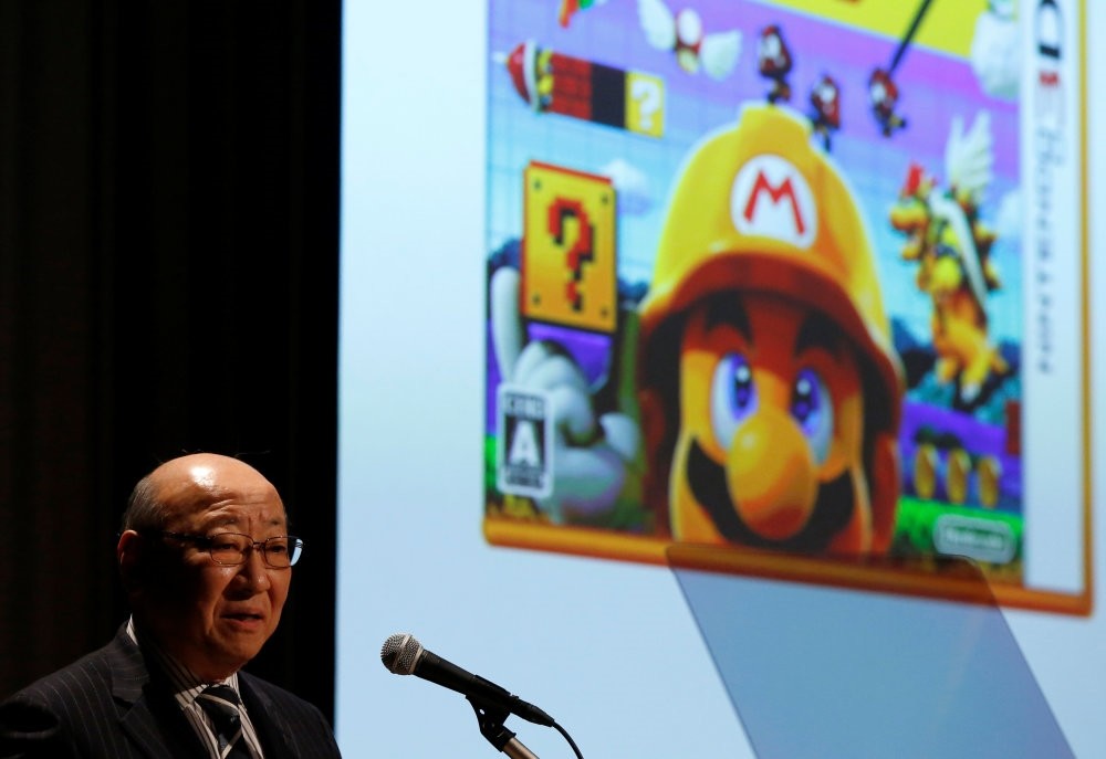 Nintendo Co President and CEO Tatsumi Kimishima attends their strategy briefing in Tokyo, yesterday.