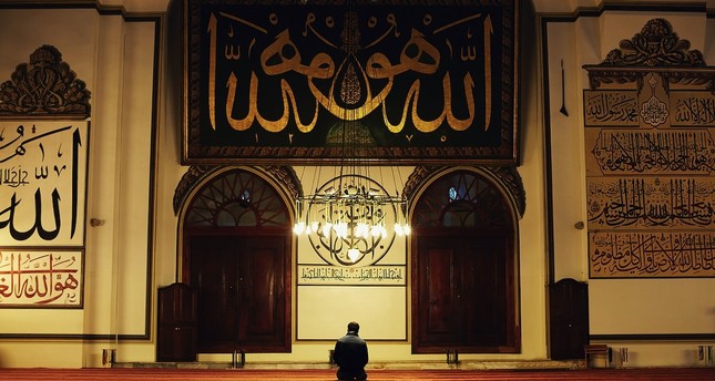 A man praying in the Great Mosque in Bursa, western Turkey.