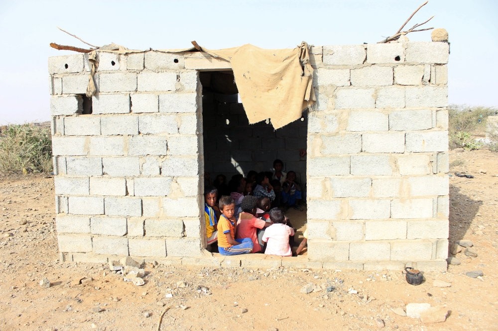 Students displaced from different cities in Yemen's northwestern province of Hajjah attend a class, Jan. 27, 2019.