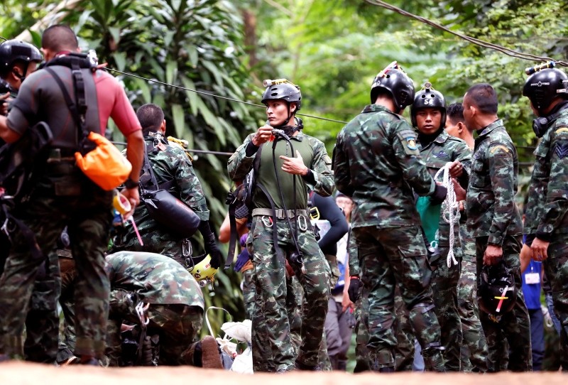 Thai soldiers prepare scuba diving gear and rescue equipment during the ongoing rescue operations for the child soccer team and their assistant coach, at Tham Luang cave. (EPA Photo)