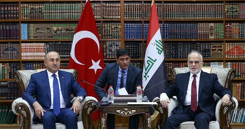 Foreign Minister Mevlu00fct u00c7avuu015fou011flu (Left) with Iraqi counterpart Ibrahim Jafari at a meeting in Baghdad, August 23, 2017 (AA Photo)
