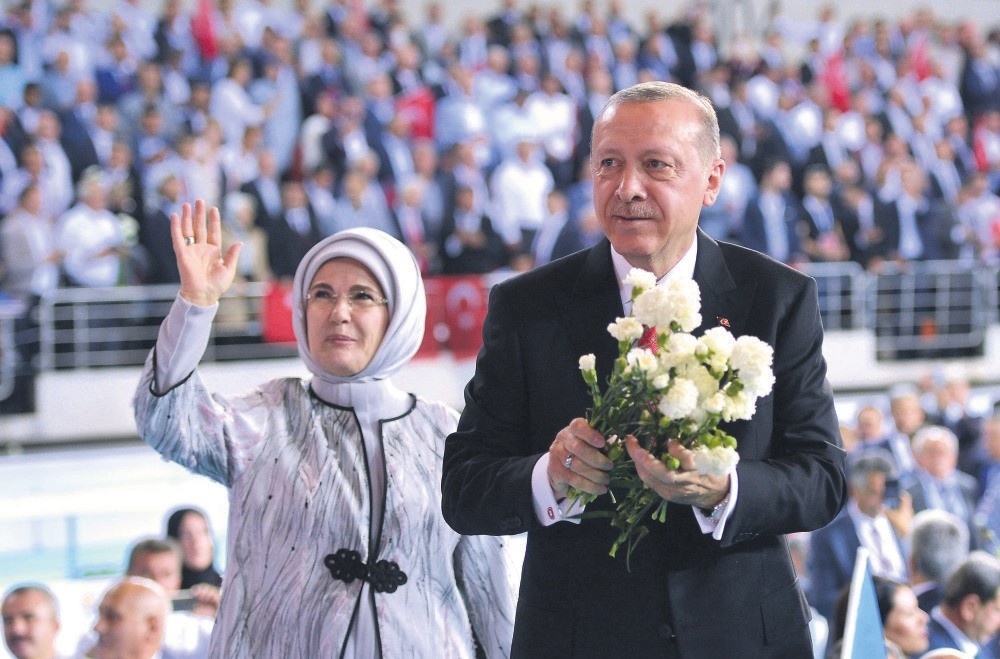 President Erdou011fan and his wife First Lady Emine Erdou011fan greet supporters during an election campaign rally of the AK Party, Ankara, May 24.