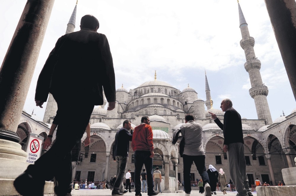 People arriving at the Sultanahmet Mosque in Istanbul for Friday prayers before the Muslim holy month of Ramadan starts, May 26. 