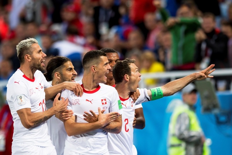 Switzerland's midfielder Granit Xhaka, center, celebrates with his teammates after scoring the 1-1 equalizer during the FIFA World Cup 2018 group E football match between Switzerland and Serbia in Kaliningrad, Russia, June 22, 2018. (EPA Photo)