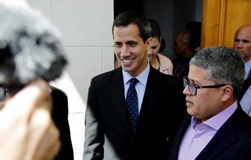 The president of the Venezuelan National Assembly Juan Guaido (C), arrives at the Parliament headquarters, in the Federal Legislative Palace, in Caracas, Venezuela, 29 January 2019. (EPA Photo)