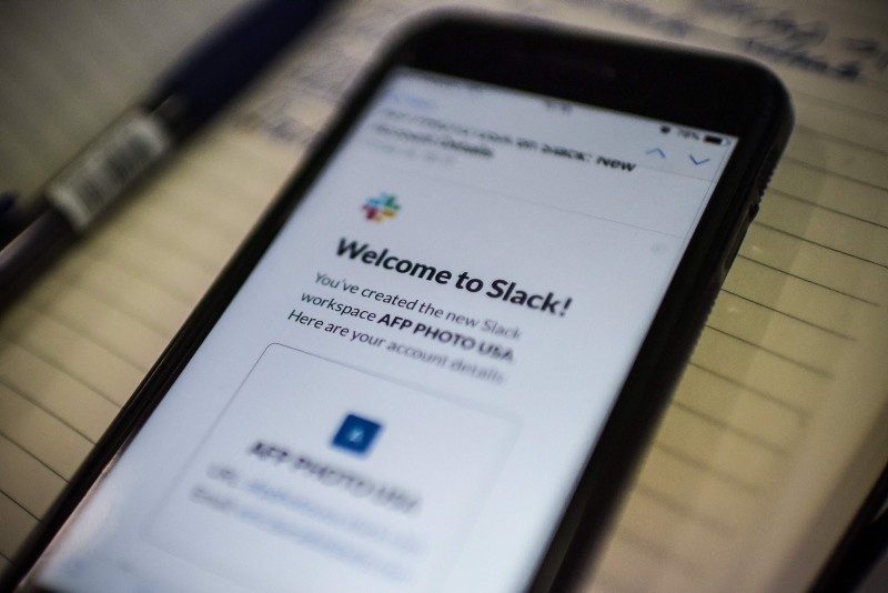 This image shows the Slack application displayed on a smarthphone screen in Washington on February 04, 2019. (AFP Photo)