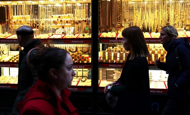 People walk in front of a gold shop at the historic Grand Bazaar in Istanbul, Nov. 27, 2017. (EPA Photo)