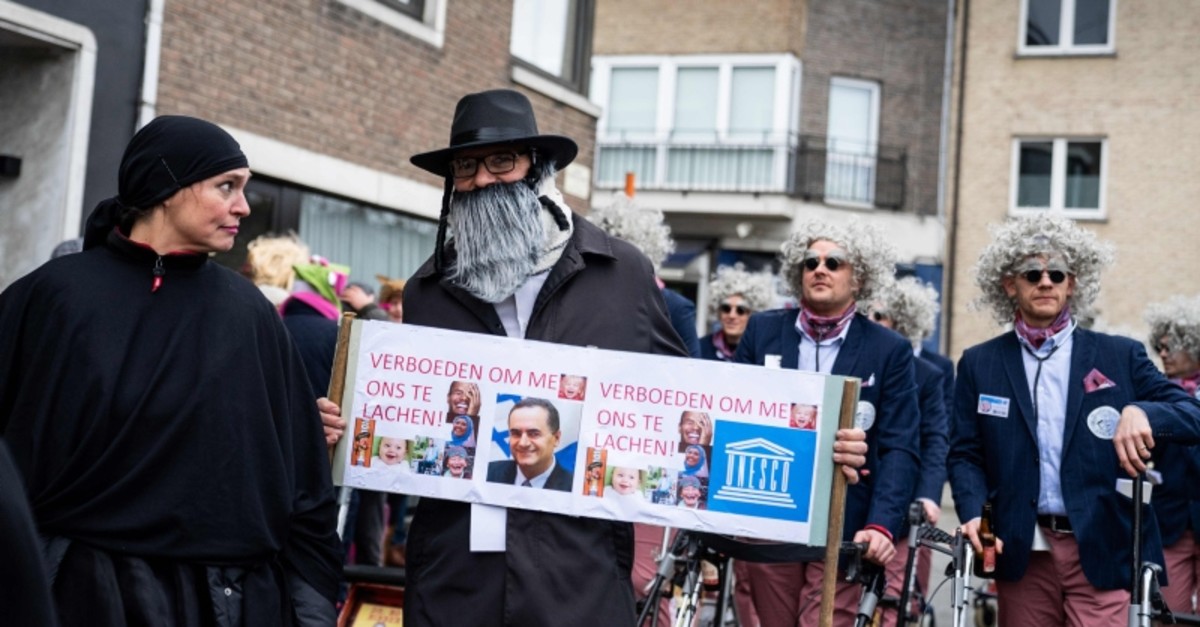 Karnaval Belgia menentang seruan untuk membatalkan parade dengan karikatur Yahudi