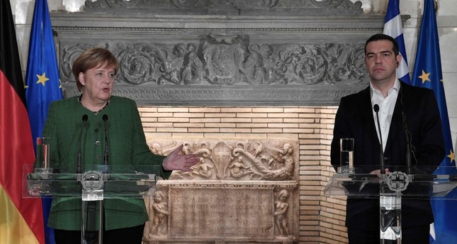 المستشارة الألمانية أنجيلا ميركل في مؤتمر صحفي مع رئيس الوزراء اليوناني أليكسيس تسيبراس، في العاصمة اليونانية أثينا 10 يناير 2019 وكالة الأنباء الفرنسية