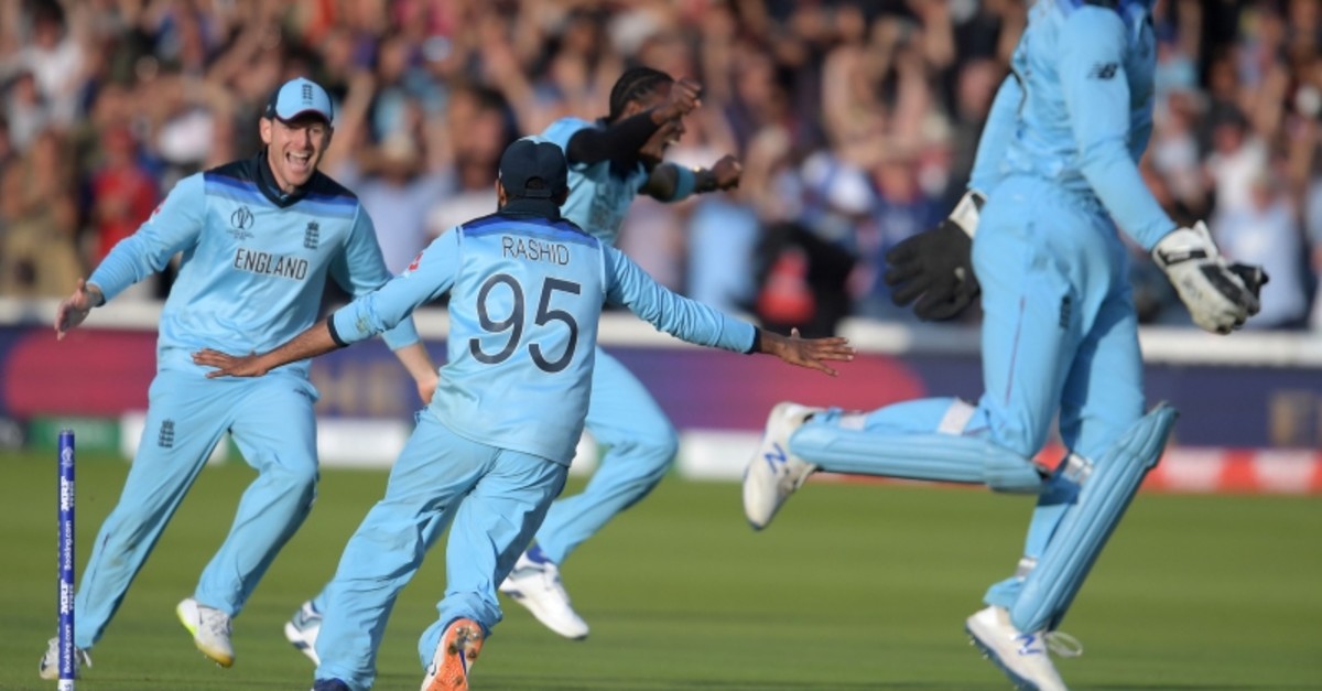 England's captain Eoin Morgan (L) celebrates with his players after victory in the 2019 Cricket World Cup final between England and New Zealand at Lord's Cricket Ground in London on July 14, 2019. (AFP Photo)