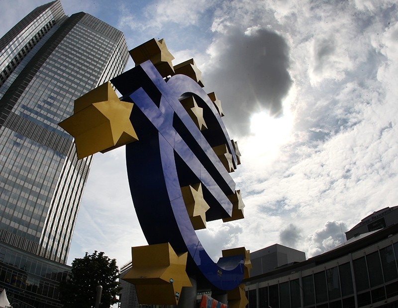 This July 31, 2012 file photo shows the euro sculpture in front of the headquarters of the European Central Bank, ECB, in Frankfurt, Germany. (AP Photo)