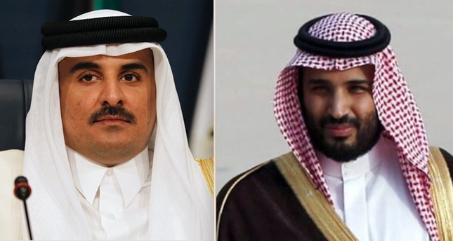 Qatari Emir Tamim bin Hamad Al Thani (L) and Saudi Crown Prince Mohammed Bin Salman (R).
