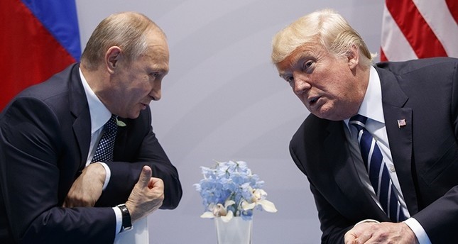 In this Friday, July 7, 2017, file photo U.S. President Donald Trump meets with Russian President Vladimir Putin at the G-20 Summit in Hamburg. (AP Photo)