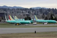 Boeing 737 MAX aircraft, including two 737 MAX 8 aircraft bearing the logo of China Southern Airlines, third from left and another seen at right, are parked at a Boeing production facility in Renton, Washington, U.S., March 11, 2019.