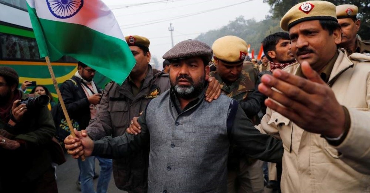 A demonstrator is detained during a protest against a new citizenship law, in New Delhi, India, Dec. 19, 2019. (Reuters Photo)