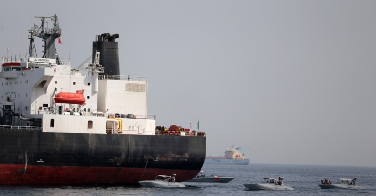 UAE Navy boats are seen next to Al Marzoqah, Saudi Arabian tanker, off the Port of Fujairah, UAE May 13, 2019 (Reuters Photo)