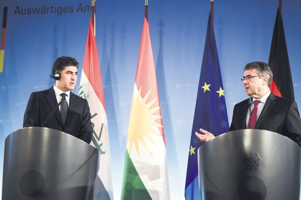 Kurdistan Regional Government Prime Minister Nechirvan Barzani and German Foreign Minister Sigmar Gabriel (R) at a joint press conference prior to their meeting in Berlin, Germany, Dec. 18.