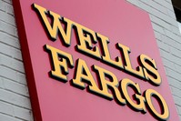 This Aug. 11, 2017, file photo shows a sign at a Wells Fargo bank location in Philadelphia. (AP Photo)