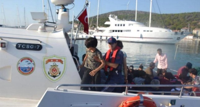 خفر السواحل في عملية إنقاذ المهاجرين وضبطهم DHA
