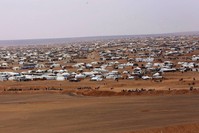 This file picture taken Tuesday, Feb. 14, 2017, shows an overview of the informal Rukban camp, between the Jordan and Syria borders. (AP Photo)