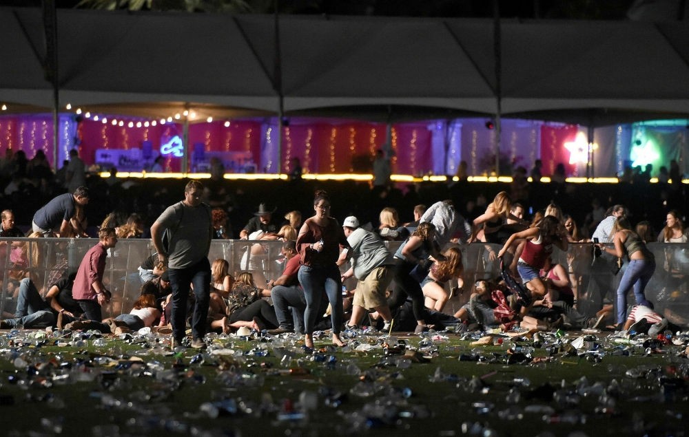 People run from the Route 91 Harvest country music festival after apparent gun fire was heard in Las Vegas, Nevada on Oct. 1. 