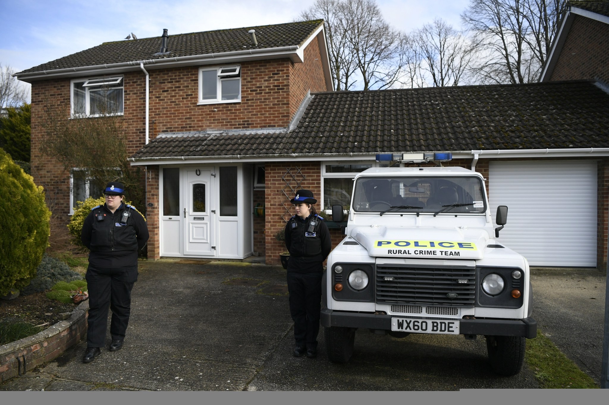 Police stand outside of an address believed to be the home of former Russian spy Sergei Skripal in Salisbury, Britain, March 6, 2018. (EPA Photo)